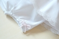 Conjunto vestido y pololos blanco de piqué con cuerpo de punto rosa