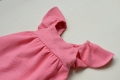 Vestido rosa chicle con lazo en la espalada
